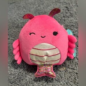 NWT Squishmallow pink sea creature whose name is Davis